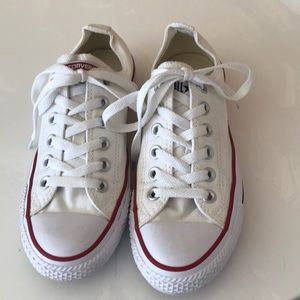 White Chuck Taylor tennis shoes